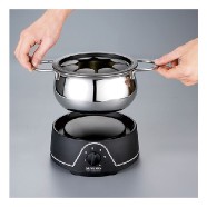 Electrical Fondue including sieve to remove meat easily